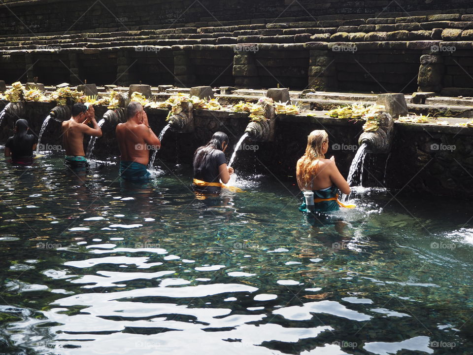 Ritual purifying bath at Pura Tirta Empul, Bali, Indinesia