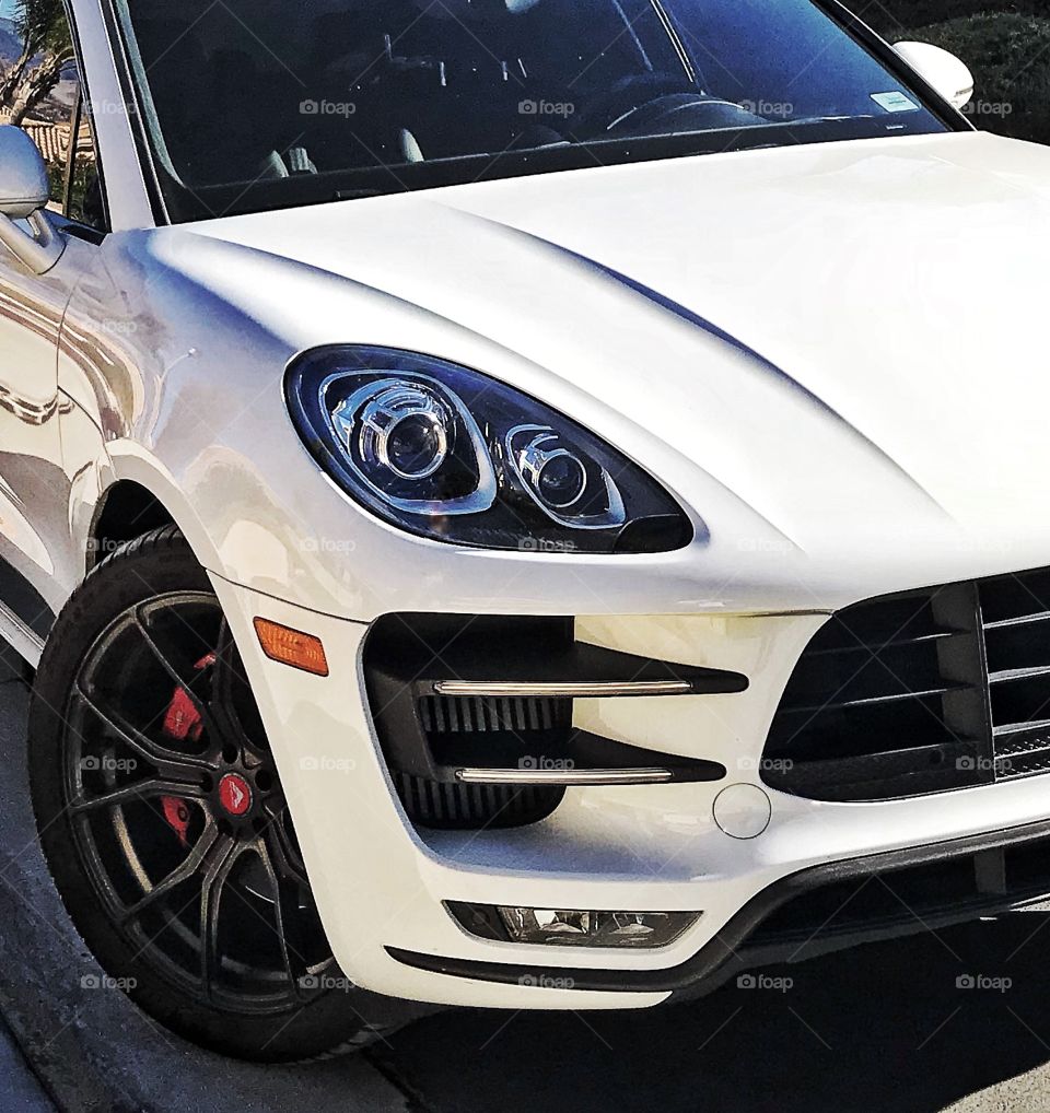 The front end details of a Porsche sport automobile