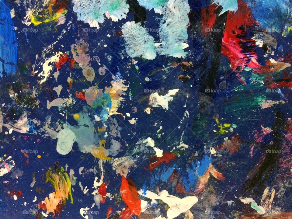 Art table with splashes of paint