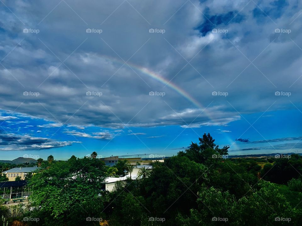 Snapshot of a rainbow. After a few drops of water from the sky...there appeared a rainbow.