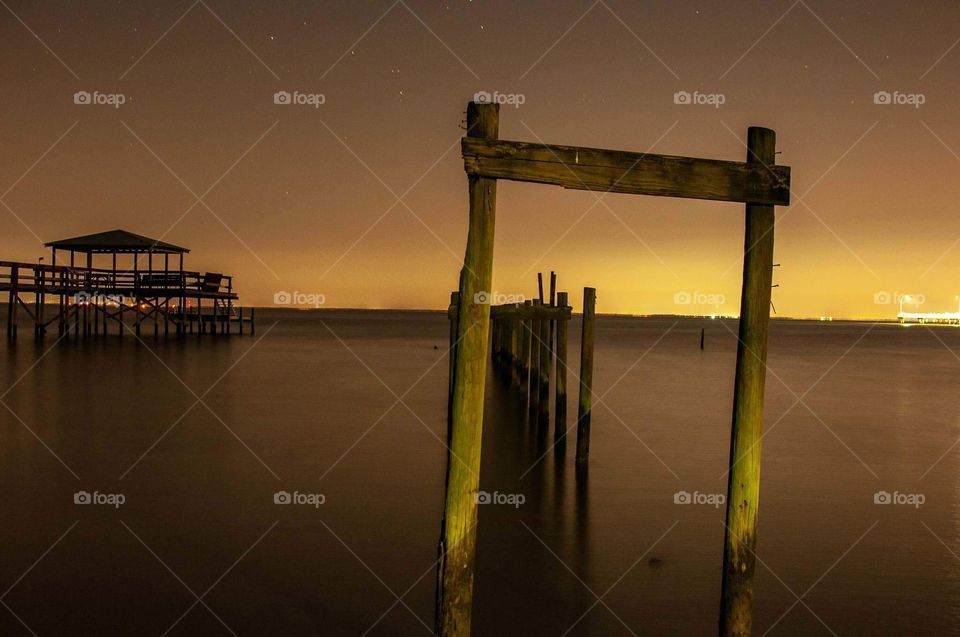 Old pier that was destroyed after hurricane Katrina still stands. 