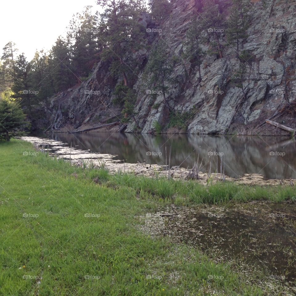 Granite creek. Small creek next to a wall of granite