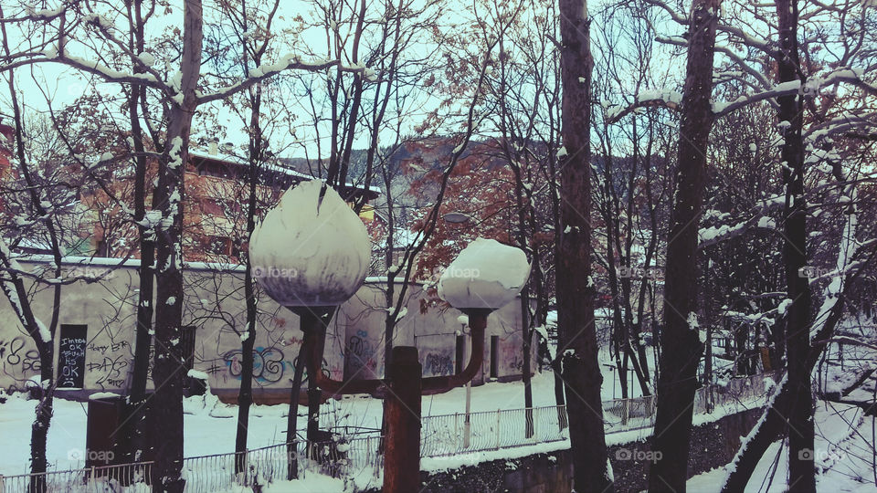 Broken Street Lamps filled with snow