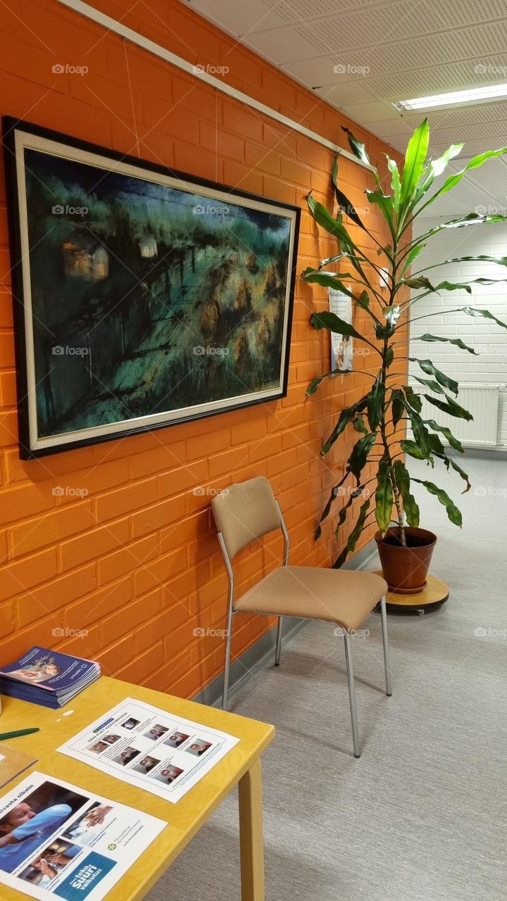 The waiting areas of the health center have a colorful and cozy interior