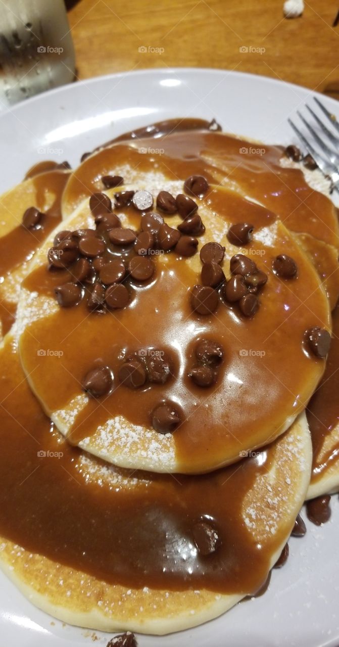 chocolate chip pancakes with peanut butter syrup