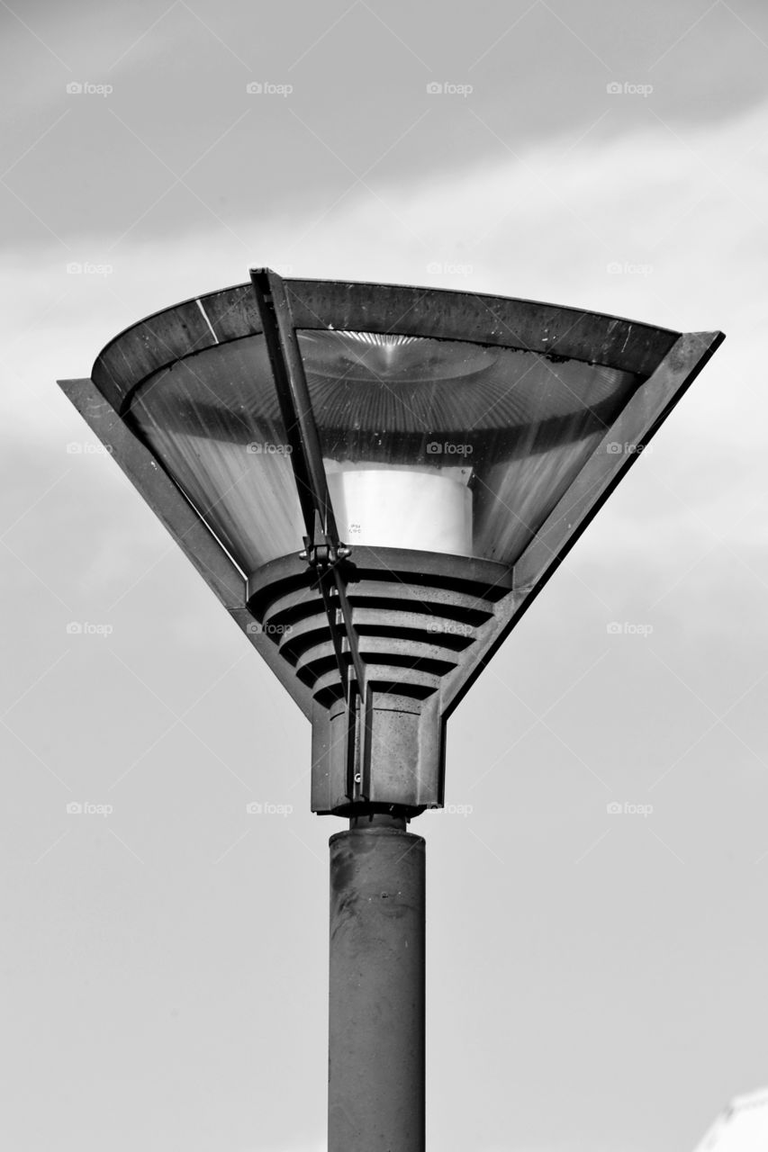 Close-up of street light against sky