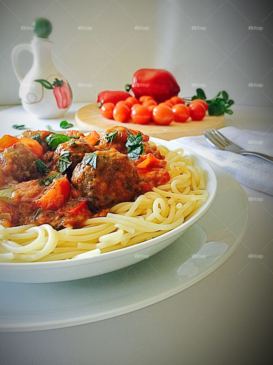 Close-up Of meatballs served with pasta in plate