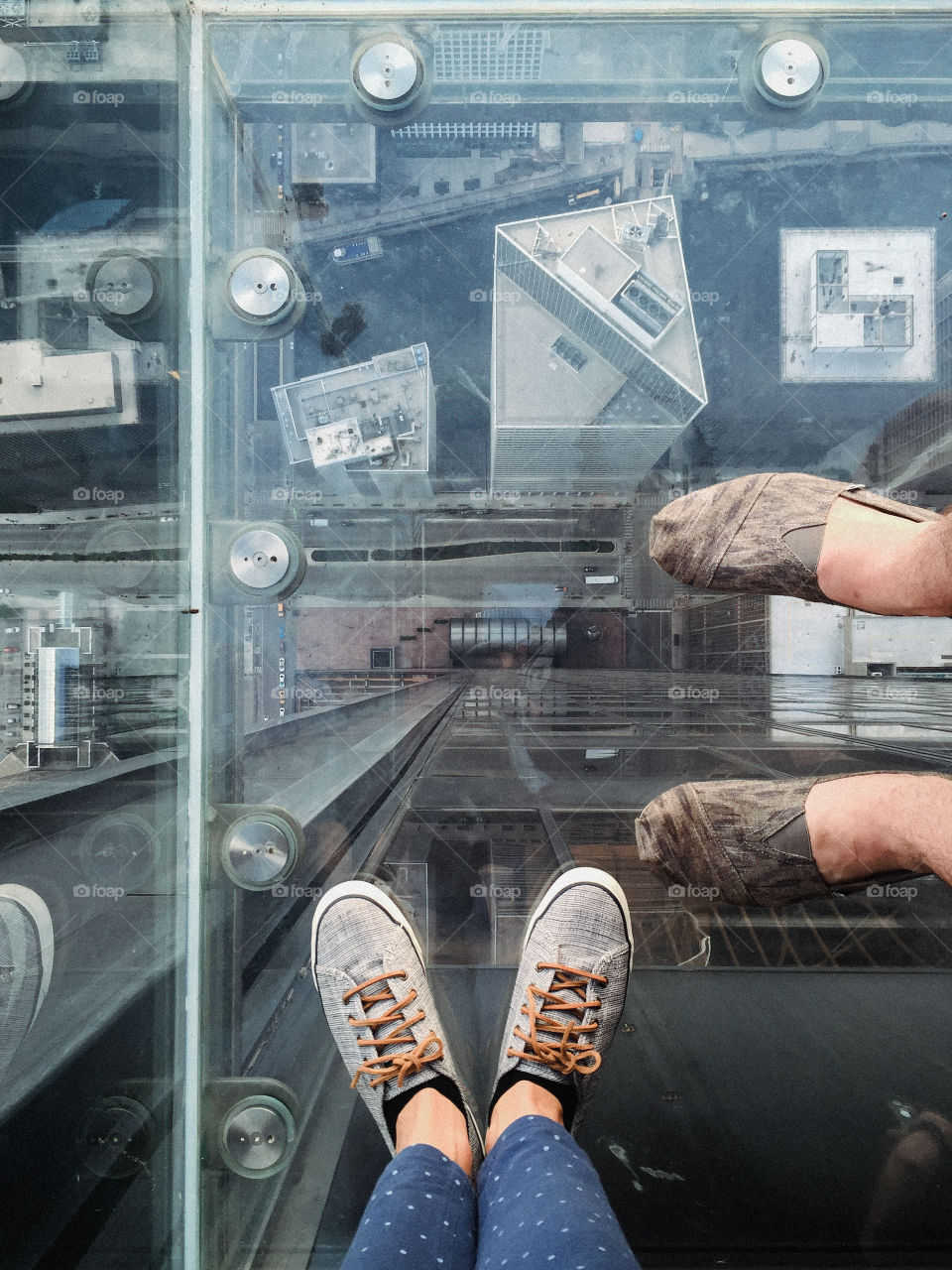 Standing at 1,353 feet above Chicago city with my love. 