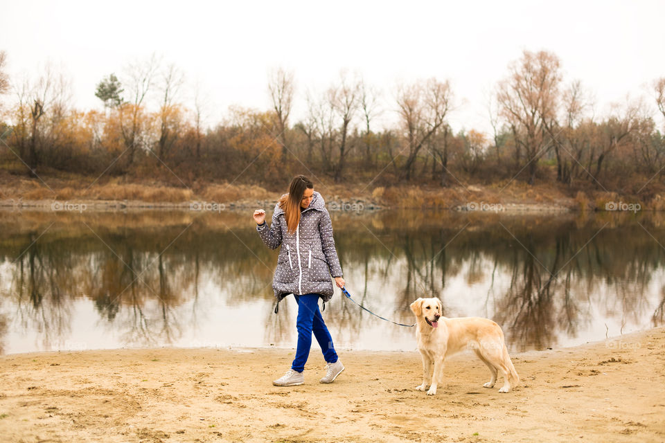 Woman walking with her dog