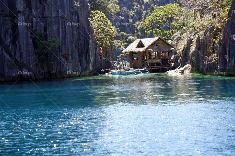 Hut in the middle of a limestone rock of twin lagoon