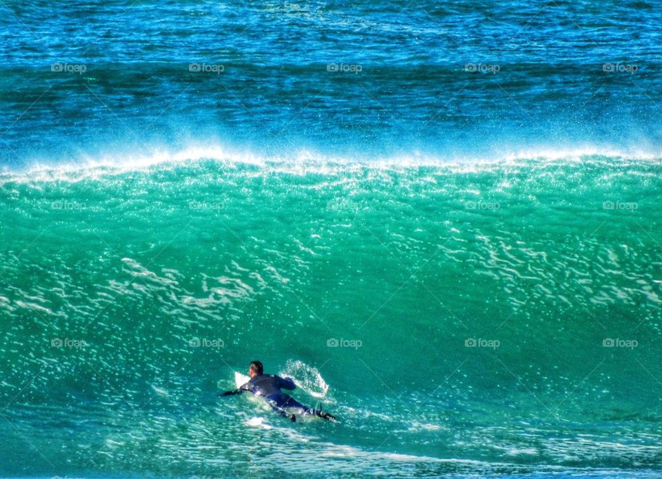 Surfer Entering The Waves At Mavericks In California. Big Wave Surfing