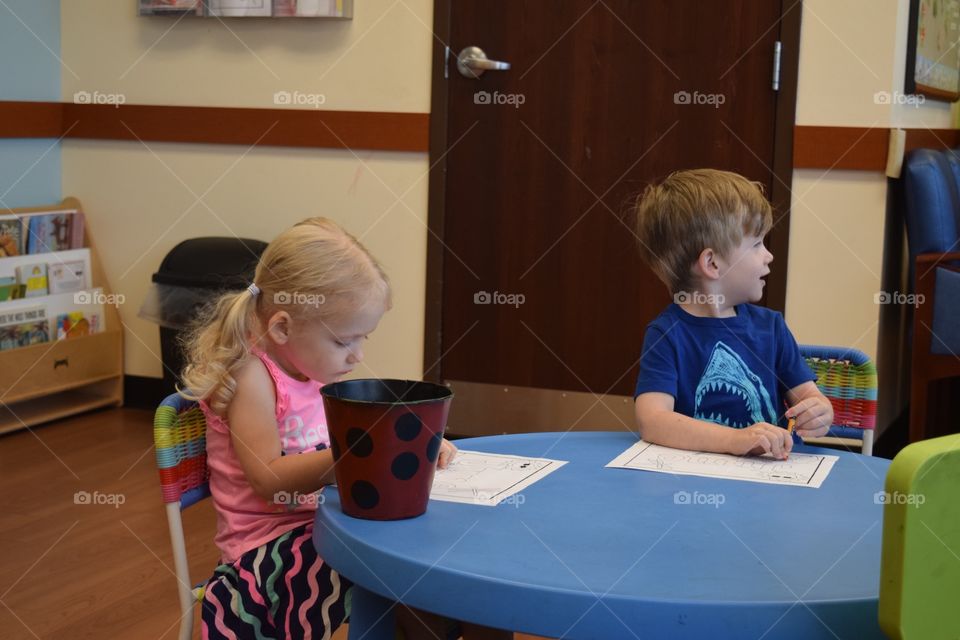 Waiting at the doctor's office. Kids at the pediatrician 