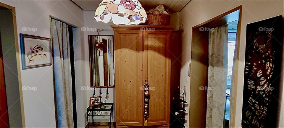 This is the entrance hall leading up to the corridor and several rooms to the left in the beautiful one story house in „Bavaria“, Germany, the kitchen and living room to the right. 2023. Hypnotic Productions