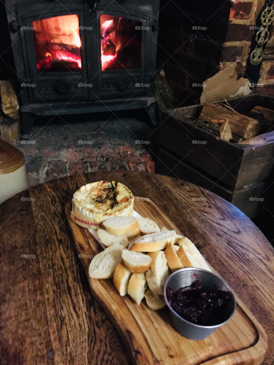 Cosy fireside winter snack Camembert pub food