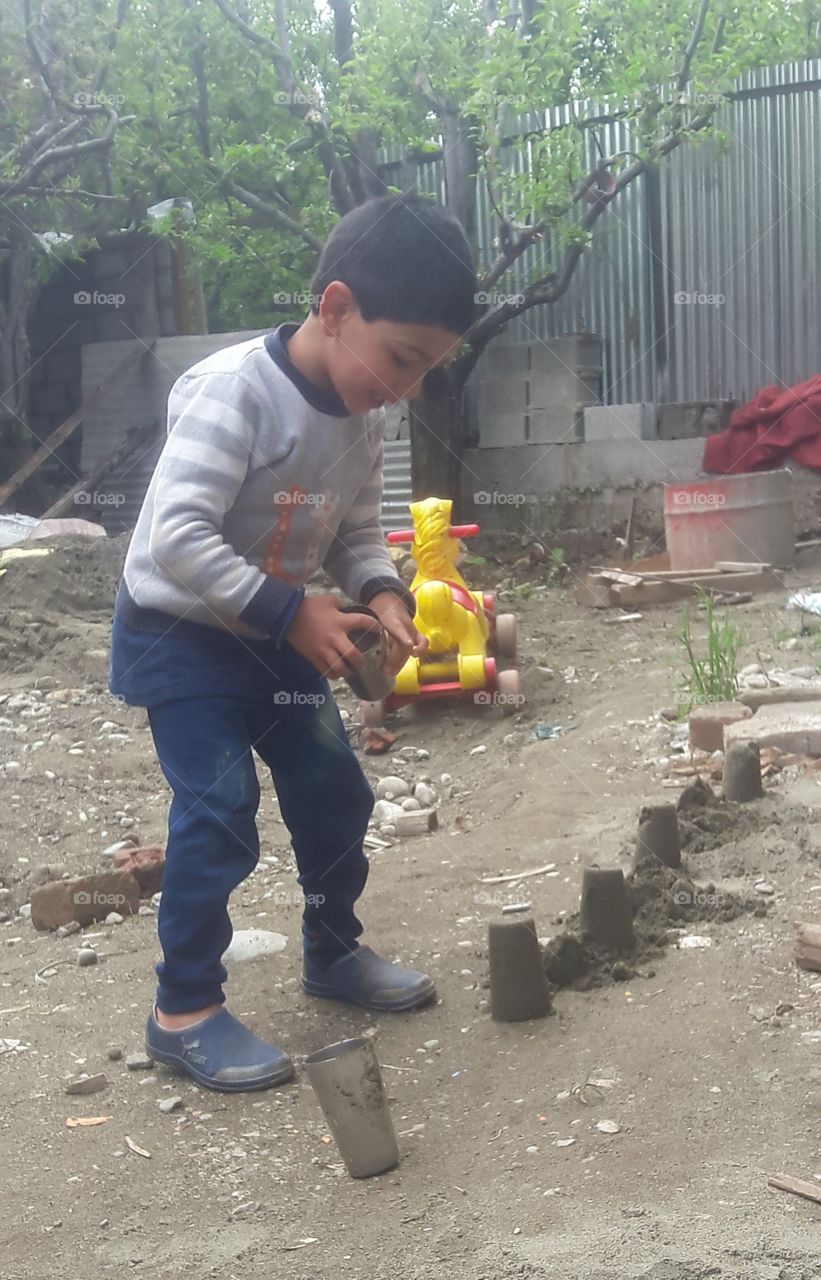 Children Staying at home & playing at Home adhering to Govt Orders of Lock Down in wake of COVID-19 epidemic.