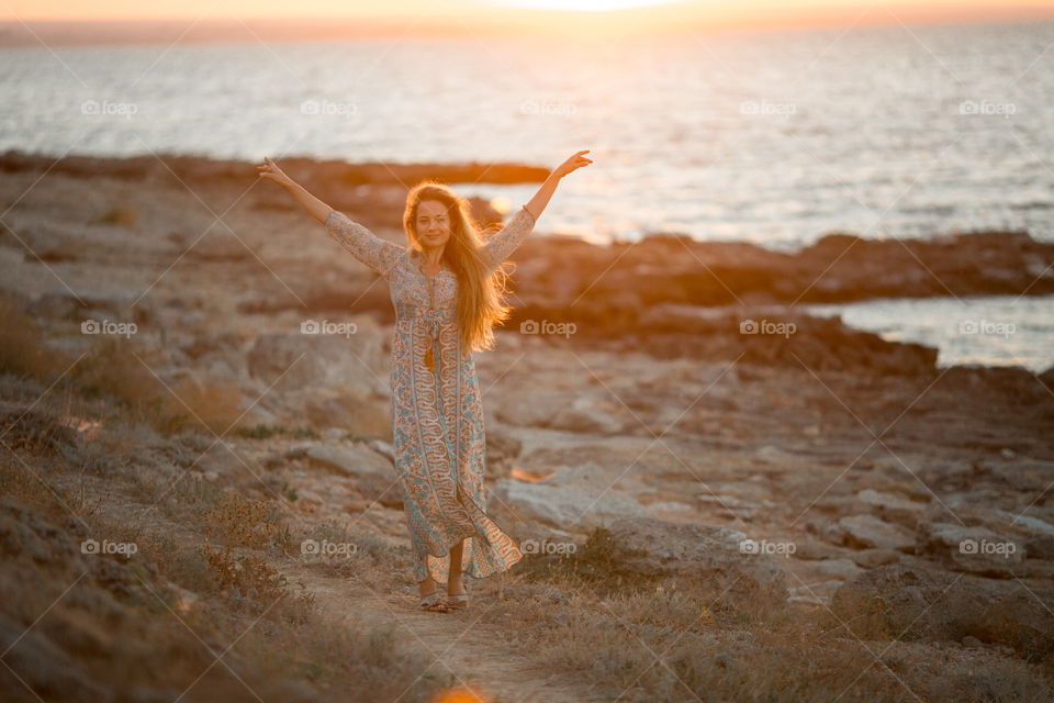 Portrait of beautiful young woman at outdoor