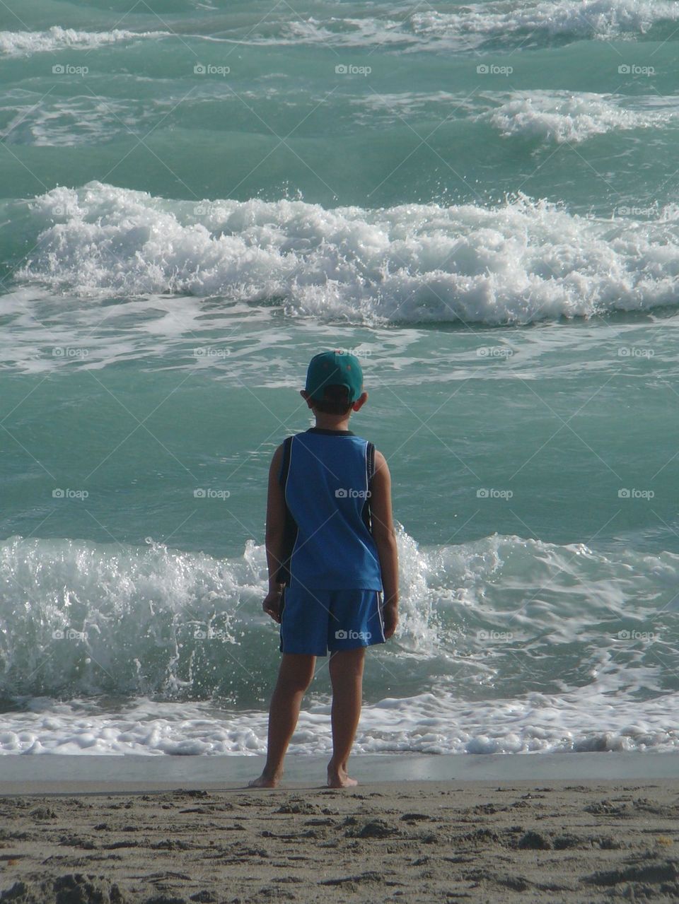 Boy looking at ocean