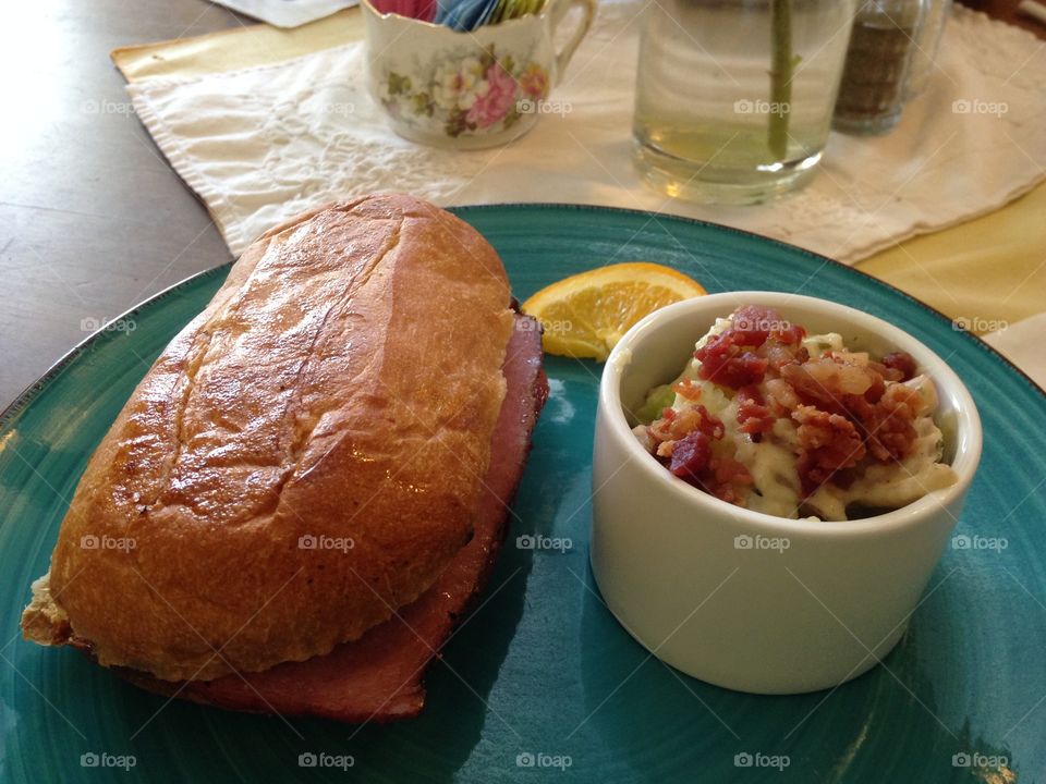 Toasted Italian sandwich and potato salad 