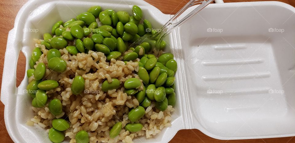 healthy lunch at work of edamame and brown rice