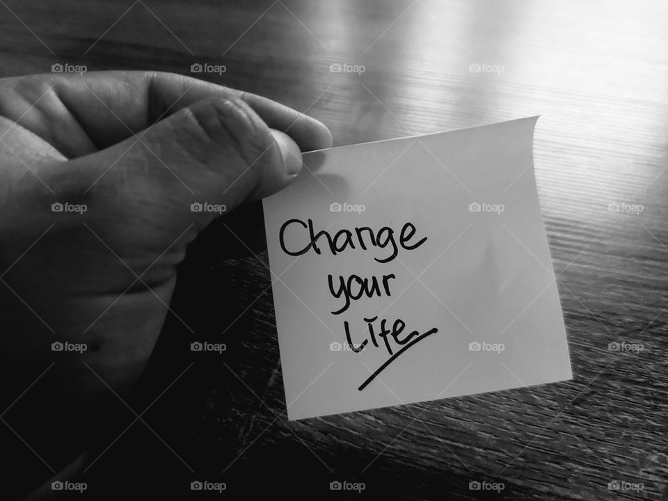 Motivational quotes on a small piece of paper