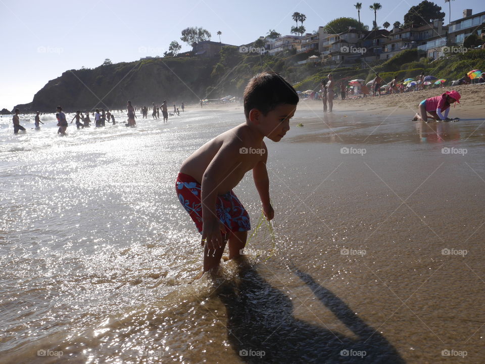 Boy at beach. Fun
