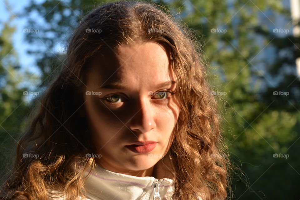girl beautiful portrait close up in the sunlight