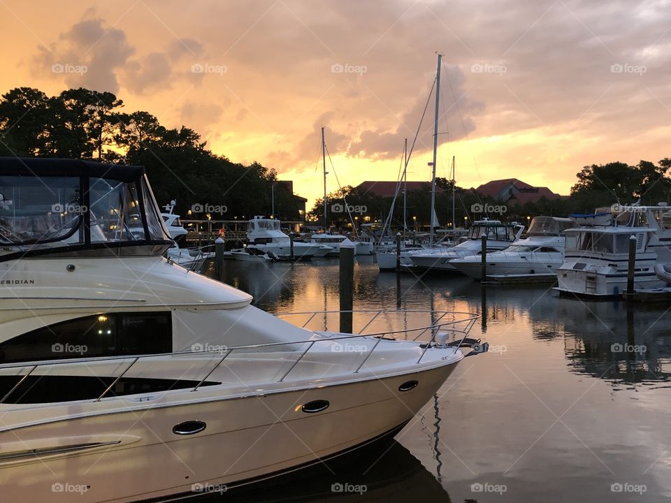 Sunset harbor with yachts