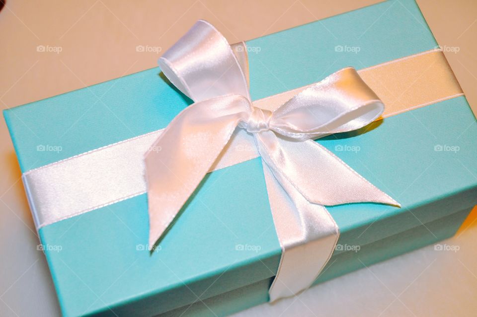 A pretty blue wrapped present.