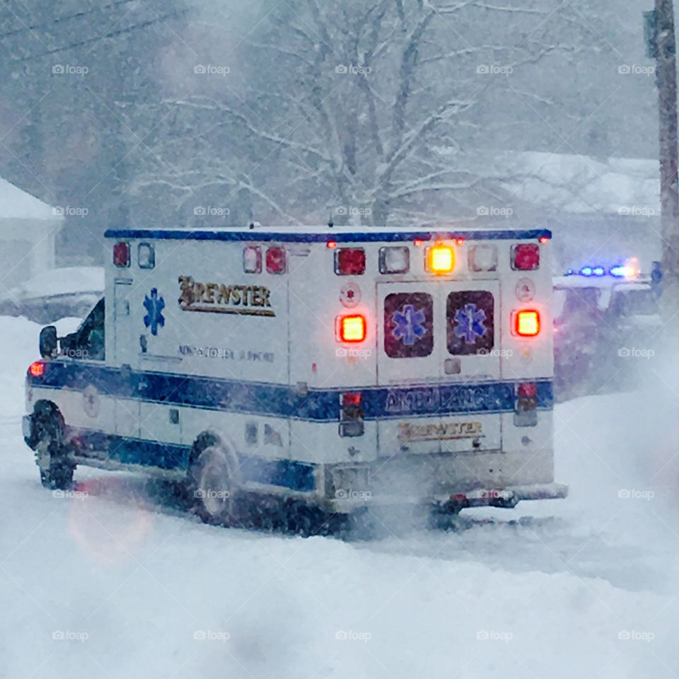 Ambulance for Medical Call In Snowstorm

