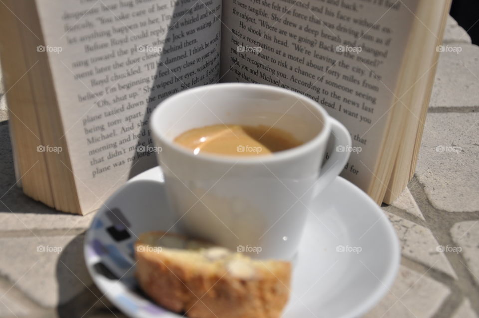 book with a cup of espresso