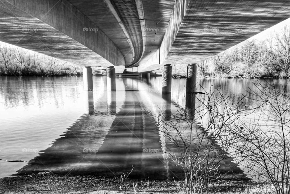 Reflection under a bridge