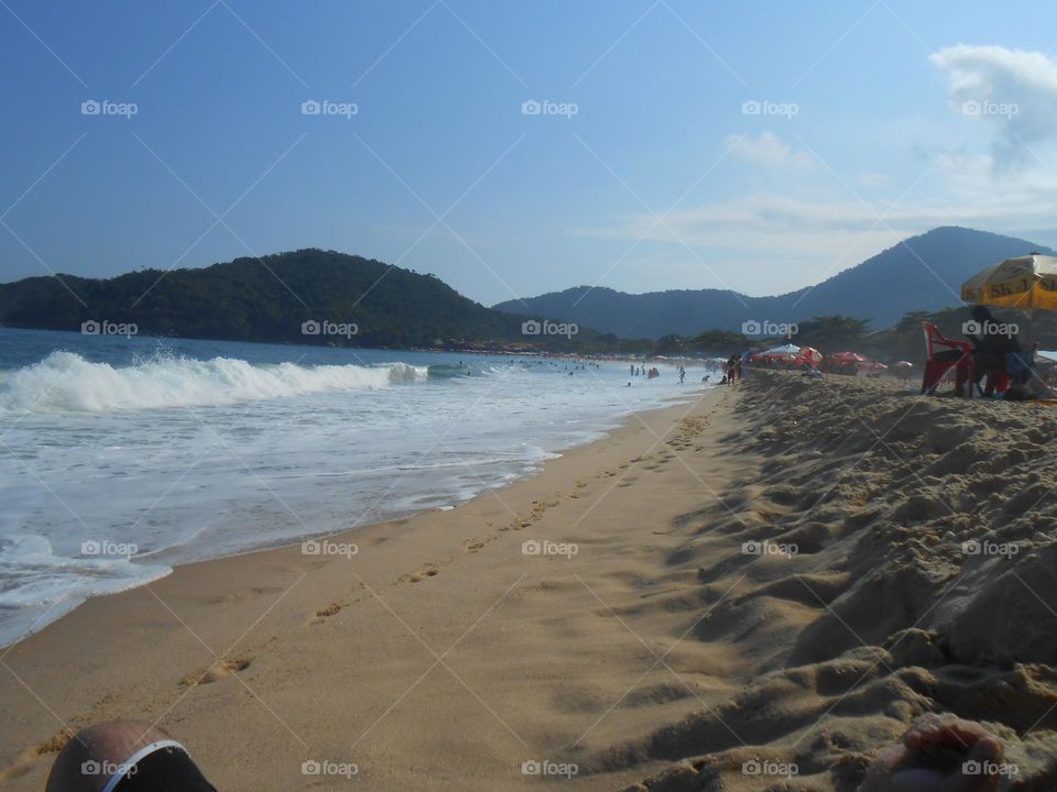 descanso na areia da praia