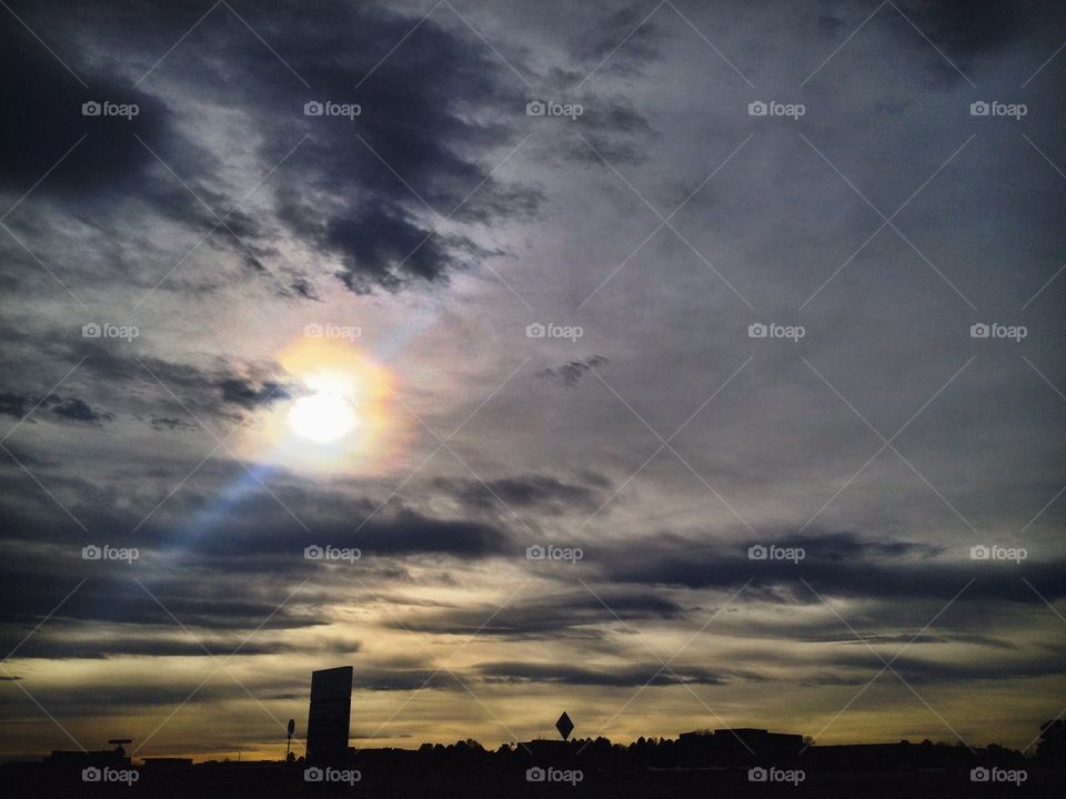 Sun Ray . Suns rays shine through clouds