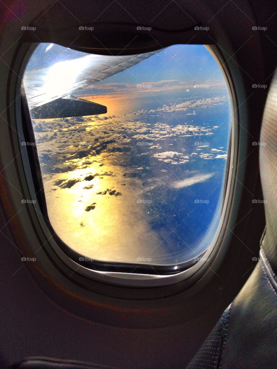 Sunset through plane window