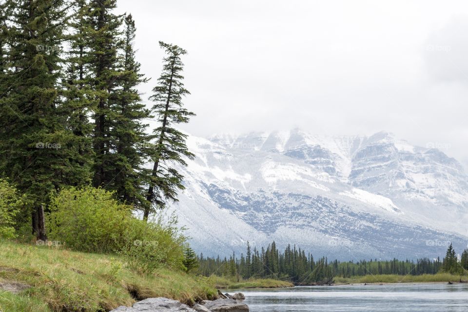 Canada Rocky Mountains
 glacier fed lake remote
