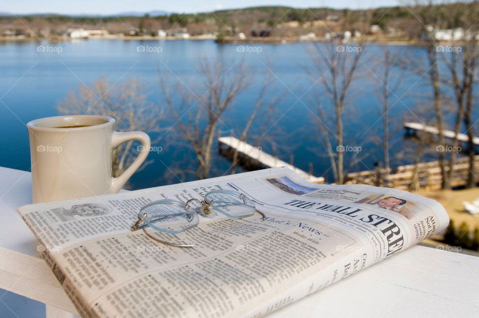 Morning coffee on the deck by the lake