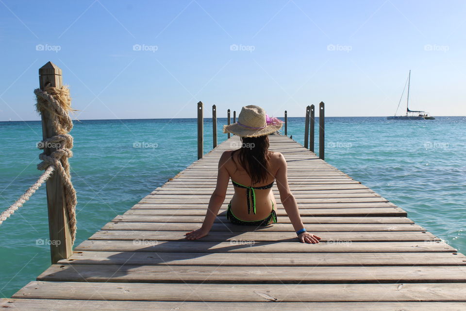 young girl on the dock