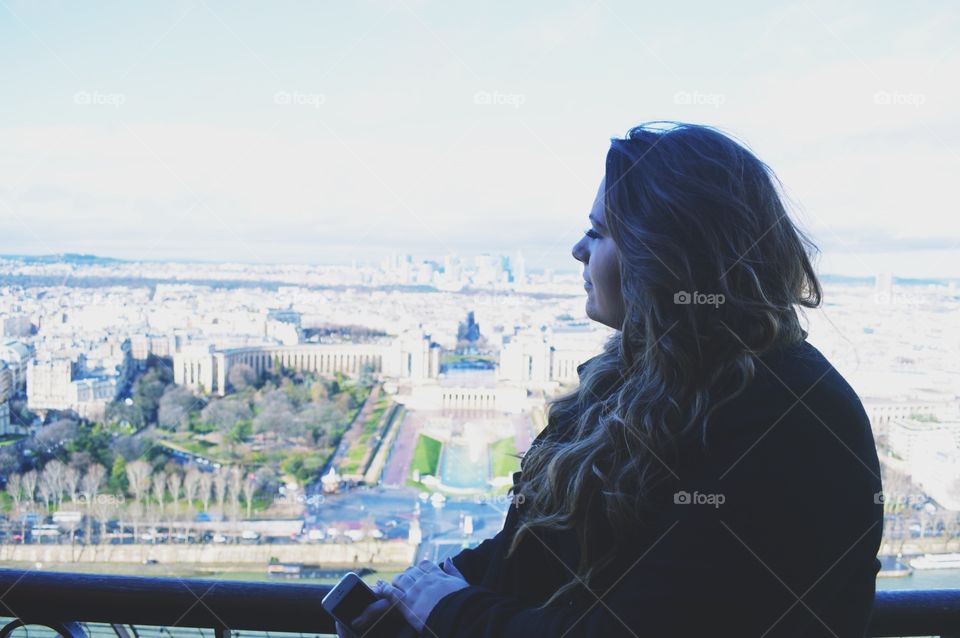 Alice in Paris. On top of the Eiffel Tower