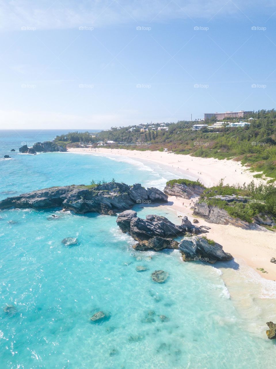 Gorgeous pristine blue water surrounding the beautiful sandy beaches of Bermuda - Tropical vacation paradise