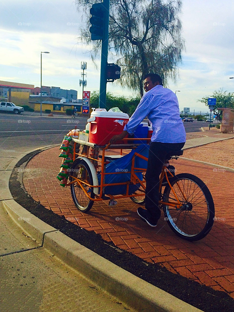 Man on bike selling food