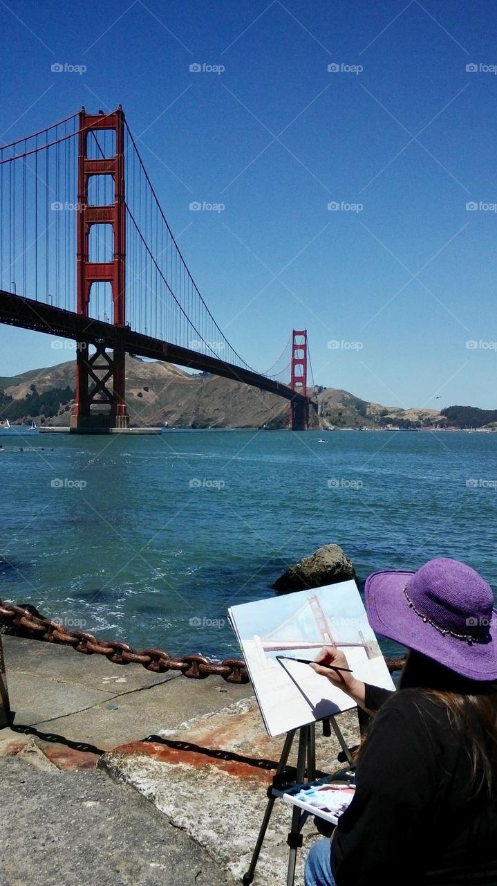 An artist. Golden Gate Bridge 
