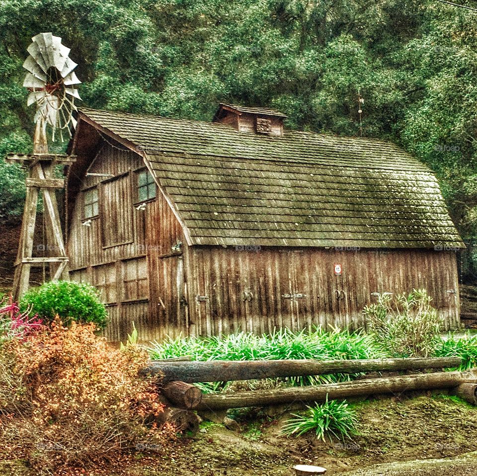 Traditional windmill near house