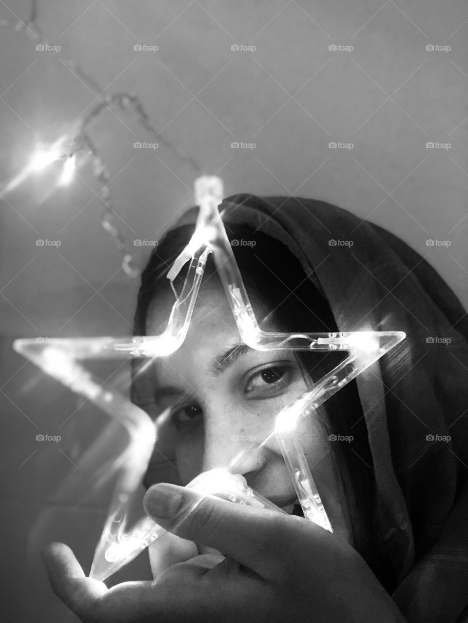 Just placed our lights for Ramadan and they shine so beautifully. I love the vibrant shinning star. I decided to do this selfie in black and white because it seemed to show off the light perfectly.