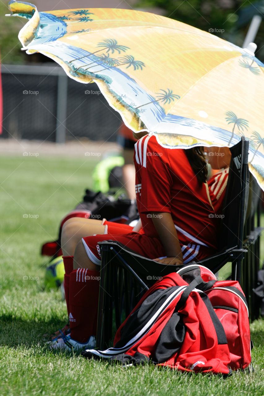 Girl in red soccer uniform