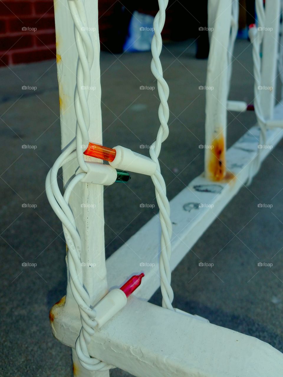 railing with Christmas lights