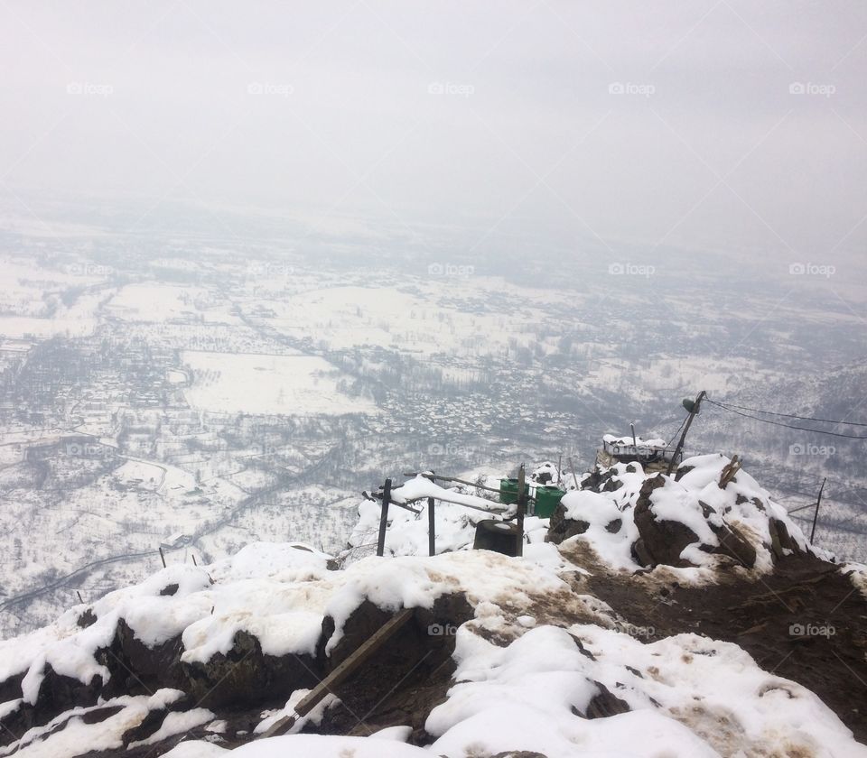 Scaling depth of the beauty is at the peak of a mountain