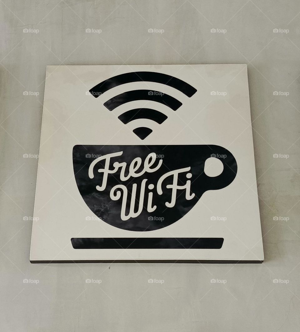 Free wifi sign at coffee shop