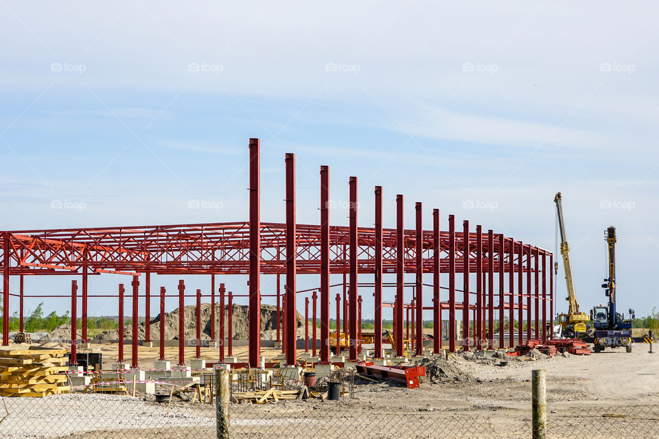 the steel frame of a new factory building under construction