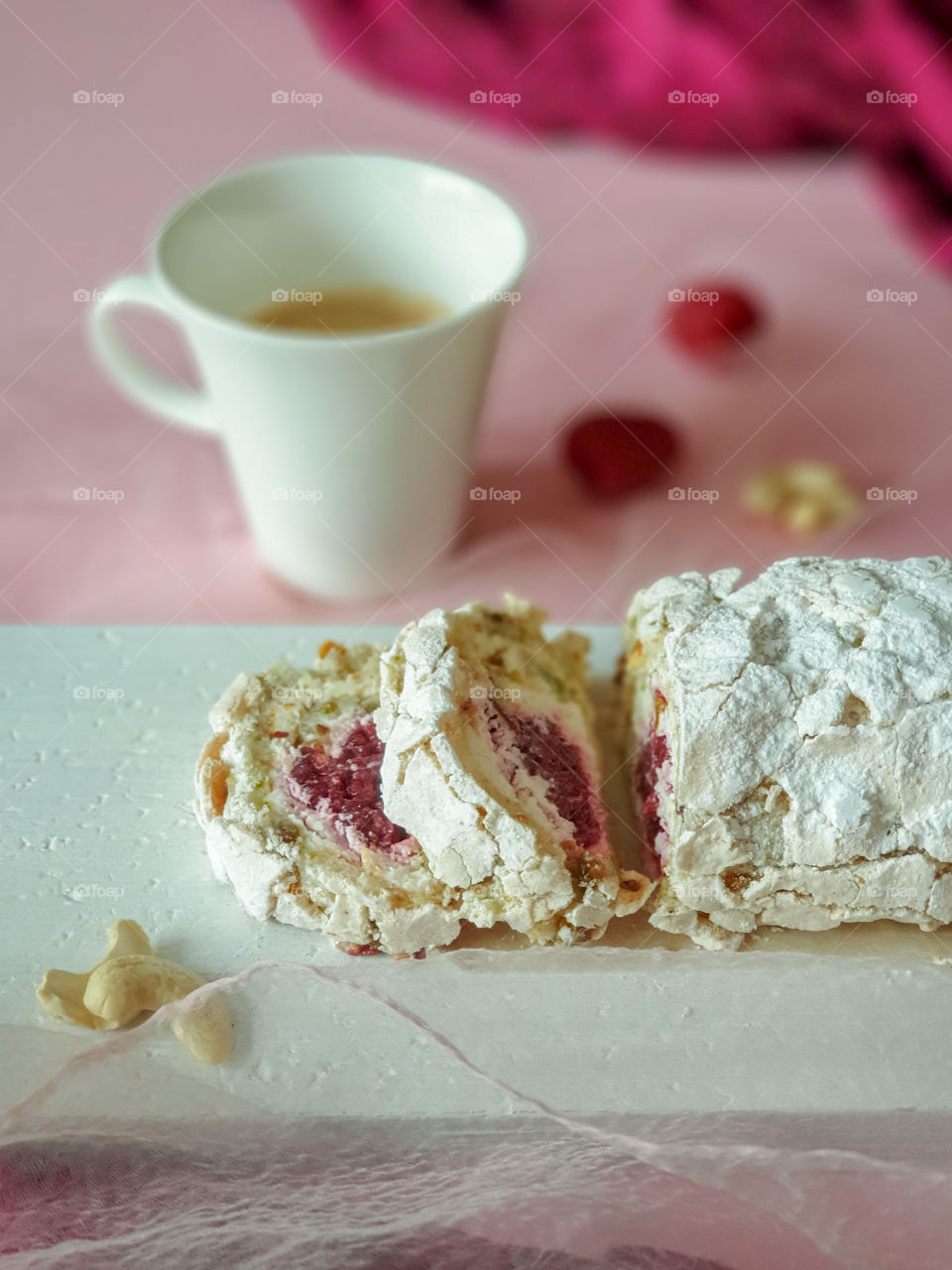 Romantic Breakfast with a raspberry nut cake, cup of freshly brewed coffee and raspberries. Easy healthy sweet snack girl. The concept of Valentine's day. Food photos, top view, copy space