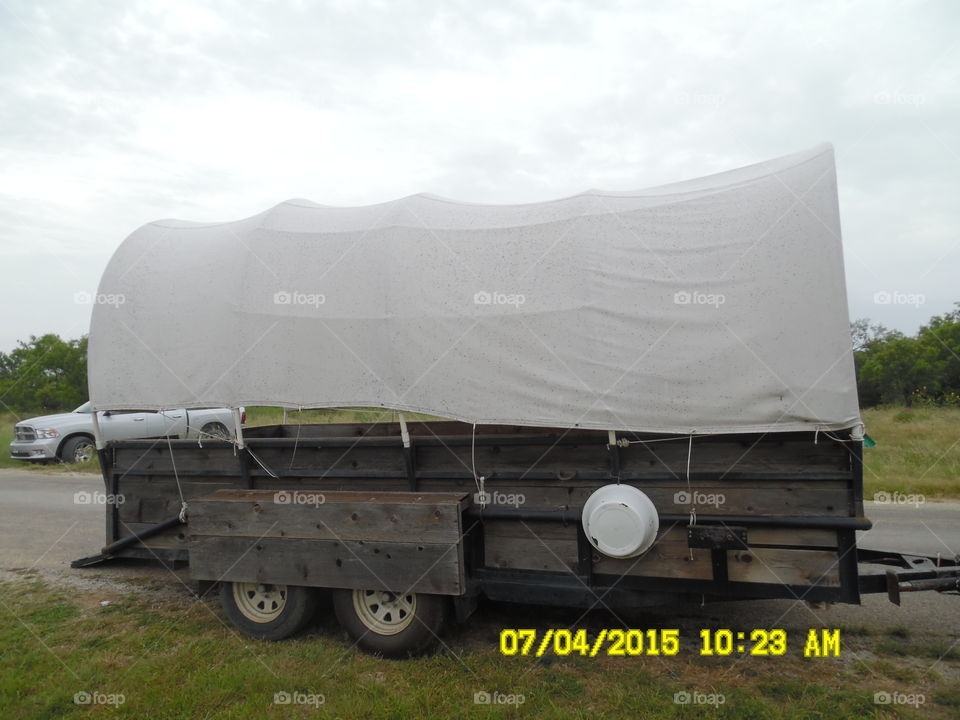 traditional covered wagon. This is the welcome wagon you will ride to see the longhorn if you visit the wildcatter ranch located east of Graham Tex